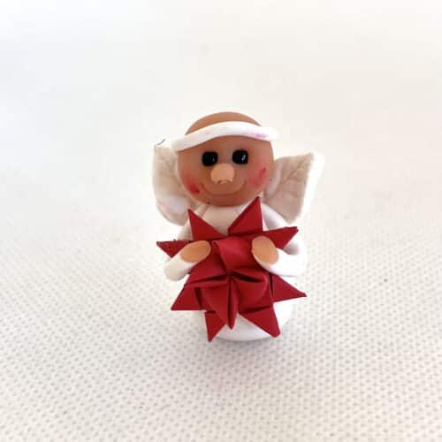 Engel med stjerne i ass. faver